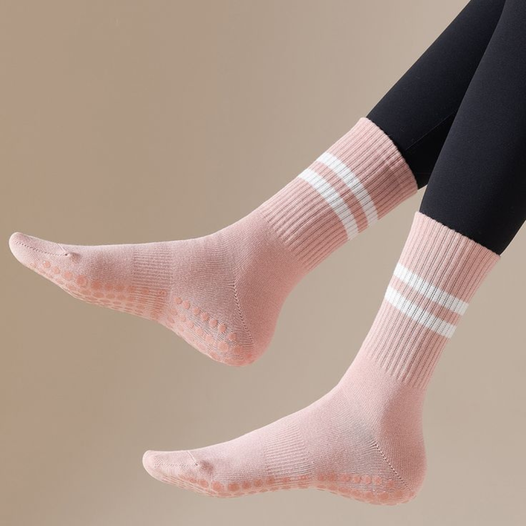 Light pink pilates grip socks with white stripes for yoga and barre – The Fit Fab Co