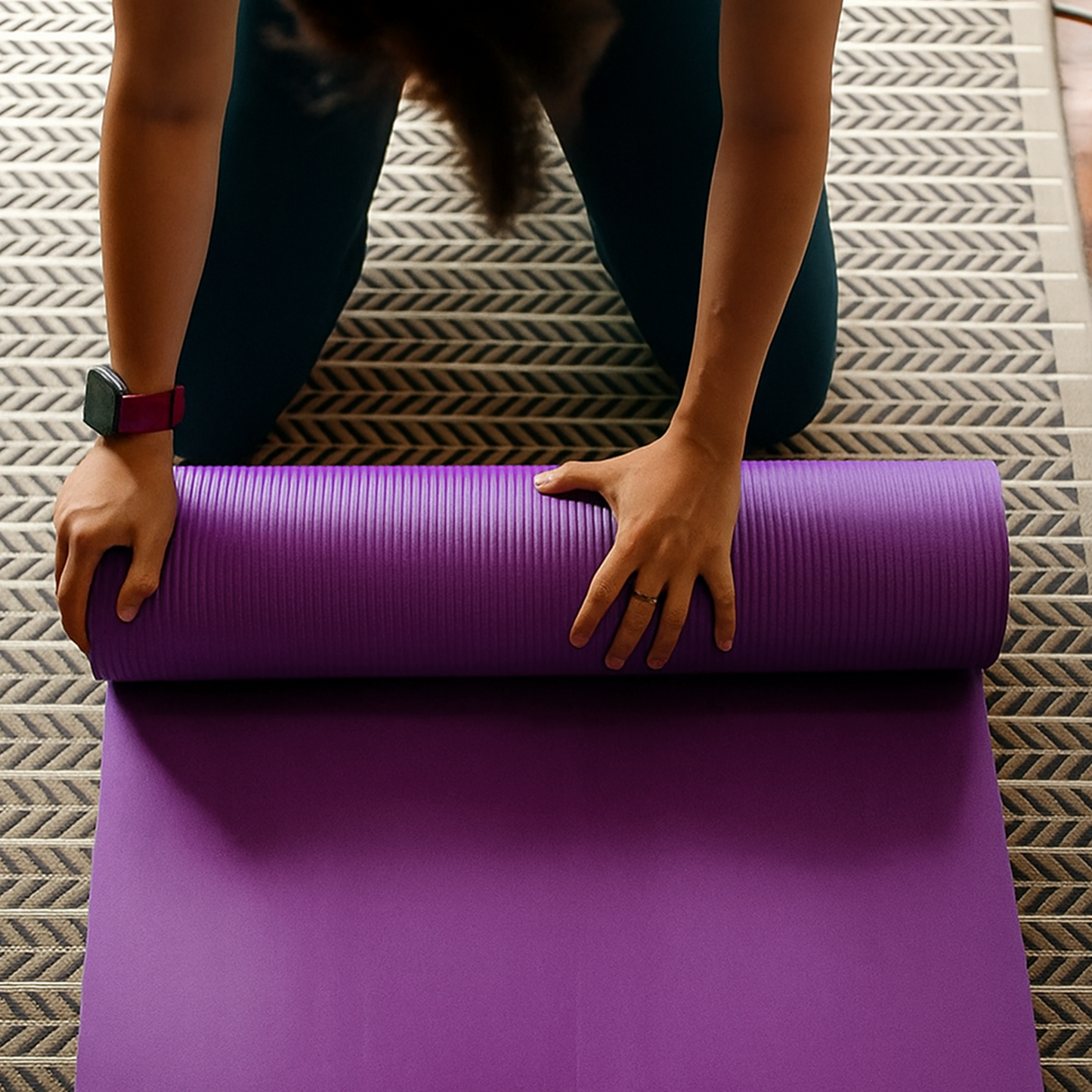 Hands unrolling purple yoga mat for floor workout – The Fit Fab Co