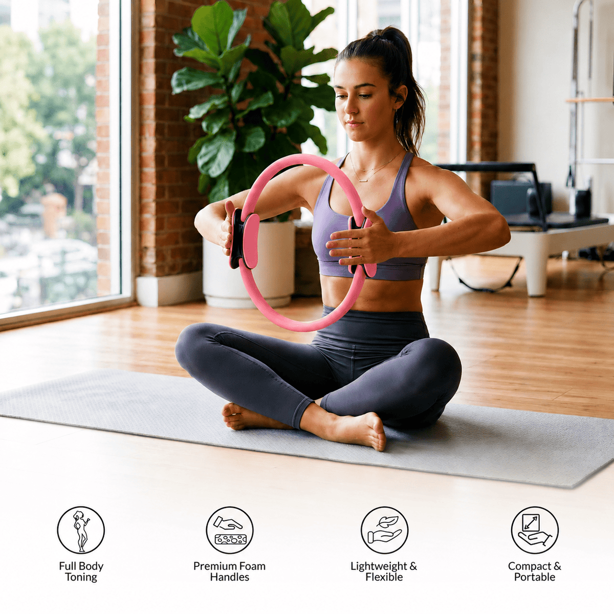 Woman using a Pilates ring for full-body exercise.