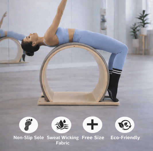 Mid calf pilates grip socks during pilates ring exercise